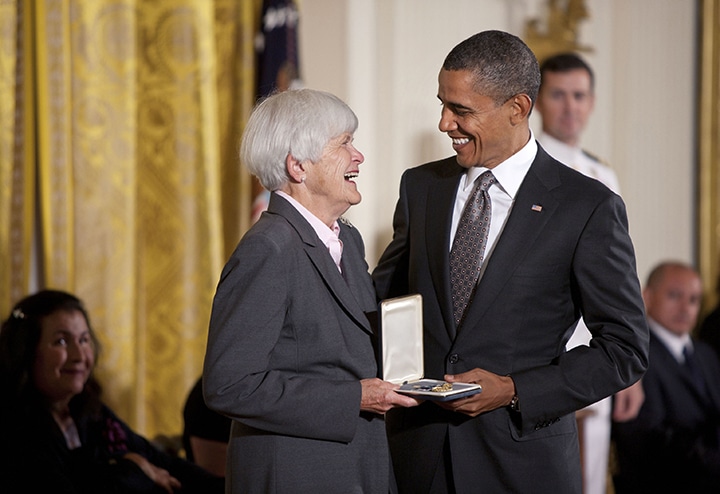 SCA Founder Liz Putnam receiving medal from President Barack Obama