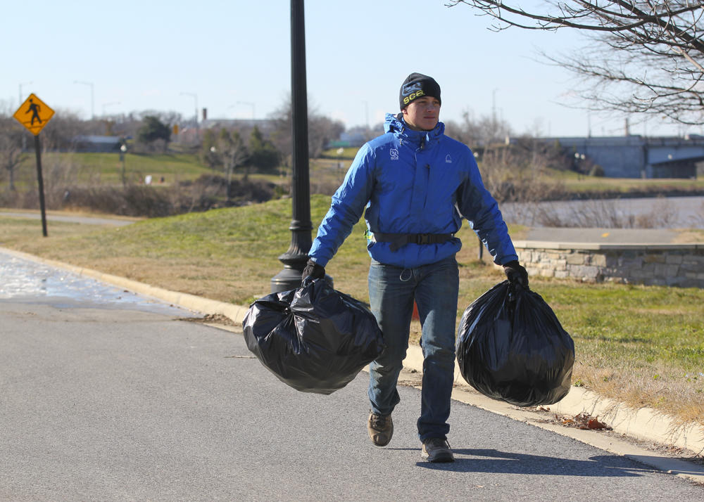 SCA leader Jeremy clears trash from the Anacostia River
