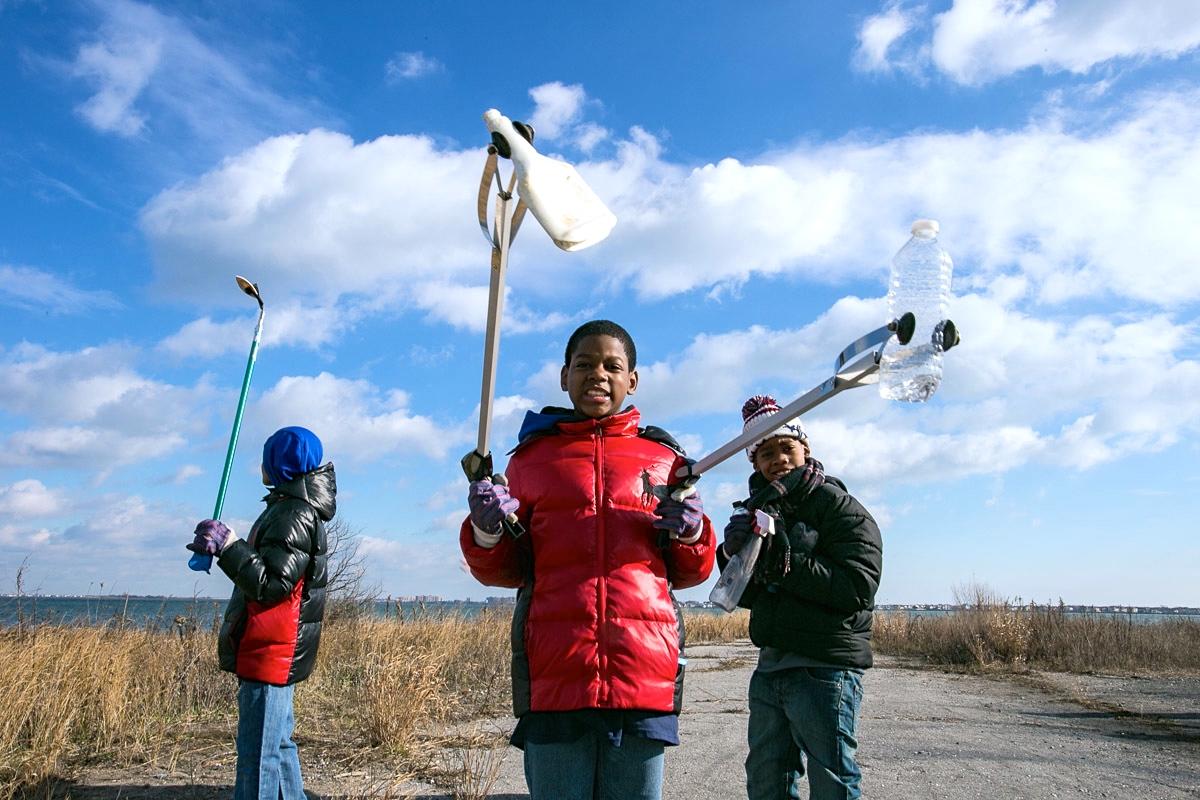 Youth volunteers collect trash along Jamaica Bay